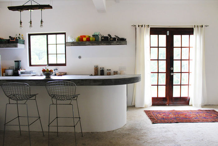 Man Builds Homes Out Of Plastic Bottles And They Look Just Like Regular Houses Man Builds Homes Out Of Plastic Bottles And They Look Just Like Regular Houses