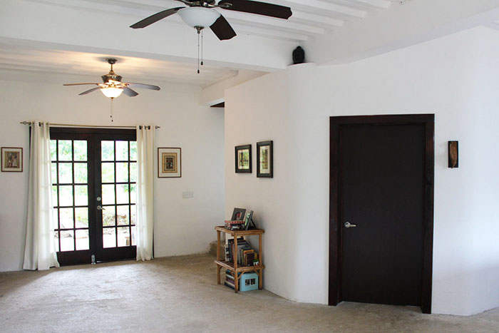 Man Builds Homes Out Of Plastic Bottles And They Look Just Like Regular Houses