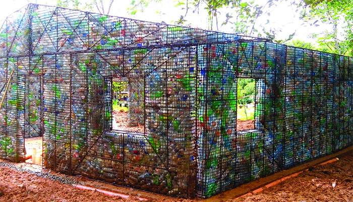 Man Builds Homes Out Of Plastic Bottles And They Look Just Like Regular Houses Man Builds Homes Out Of Plastic Bottles And They Look Just Like Regular Houses