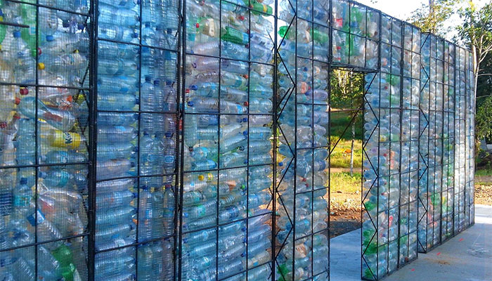 Man Builds Homes Out Of Plastic Bottles And They Look Just Like Regular Houses Man Builds Homes Out Of Plastic Bottles And They Look Just Like Regular Houses