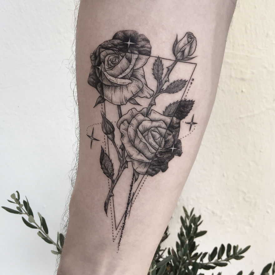 Geometric tattoo design featuring roses with sharp angles, reflecting personal events and meanings.