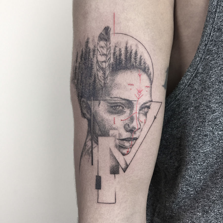 Geometric tattoo design on an arm, featuring a portrait with abstract shapes and feather details.