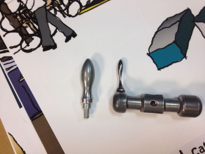 15 Years Wear Of Kids Turning A Handle At A Science Museum