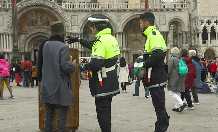 Banksy Gets Kicked Out The Venice Art Biennale After Creating Unlicensed Street Stall With Social Commentary Banksy Gets Kicked Out The Venice Art Biennale After Creating Unlicensed Street Stall With Social Commentary
