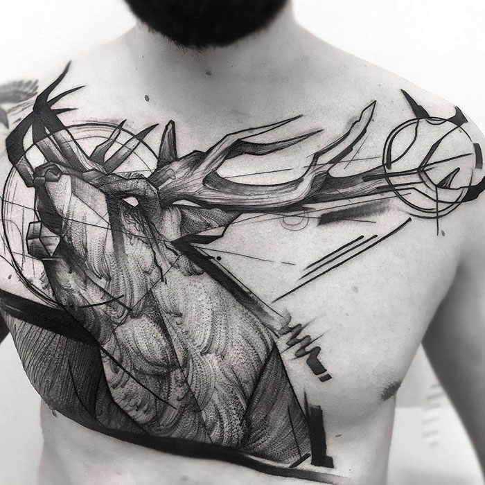 Abstract deer chest tattoo design showcasing incredible ink detail and artistry.