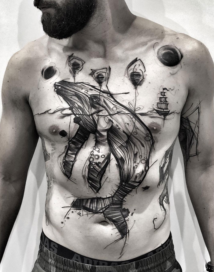 Abstract whale chest tattoo design featuring intricate details and swirling patterns.