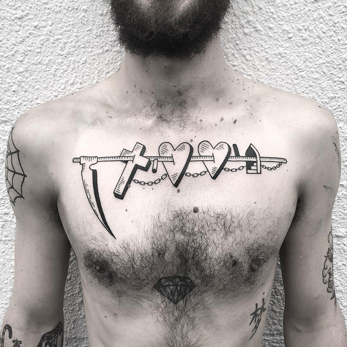 Incredible chest tattoo featuring a chain with hearts and weapon designs.
