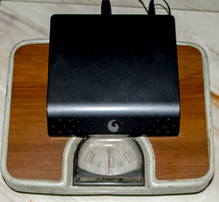 My Grandfather Is Trying To Measure 2 Terabytes = How Many Kilograms? I Am Not Able To Explain It