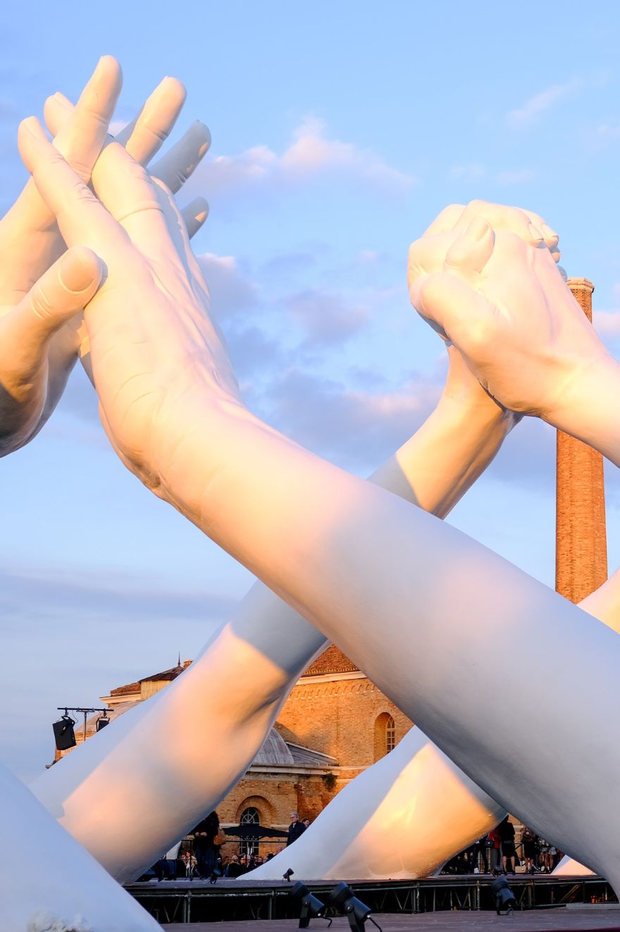 Giant Hands Reaching For Each Other Becomes The Newest Monumental Sculpture In Venice