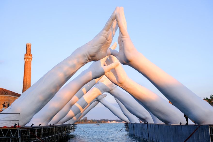 Giant Hands Reaching For Each Other Becomes The Newest Monumental Sculpture In Venice