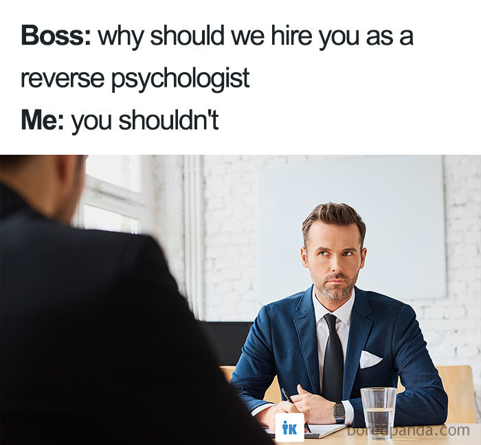 Job interview meme with a man in a suit humorously responding to a boss's question on reverse psychology.