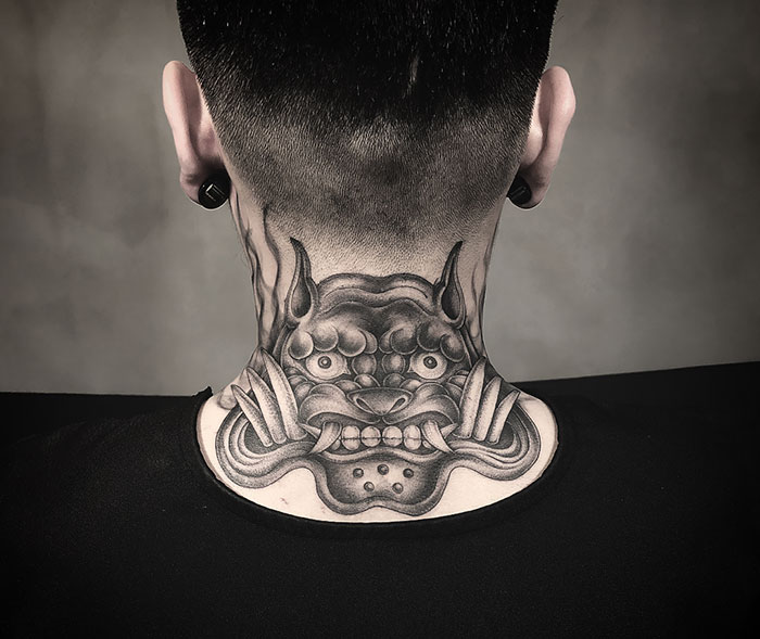 Stone Lion Neck Tattoo