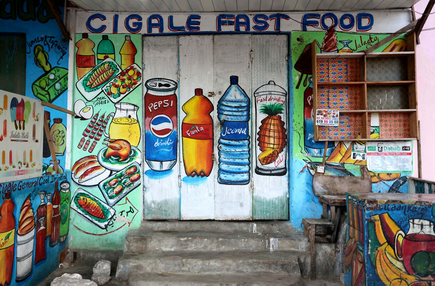 Low Literacy Rates In Somalia Means People Have To 'See' What They Buy So Storefronts Have Amazing Murals (15 Pics) Low Literacy Rates In Somalia Means People Have To 'See' What They Buy So Storefronts Have Amazing Murals (15 Pics)