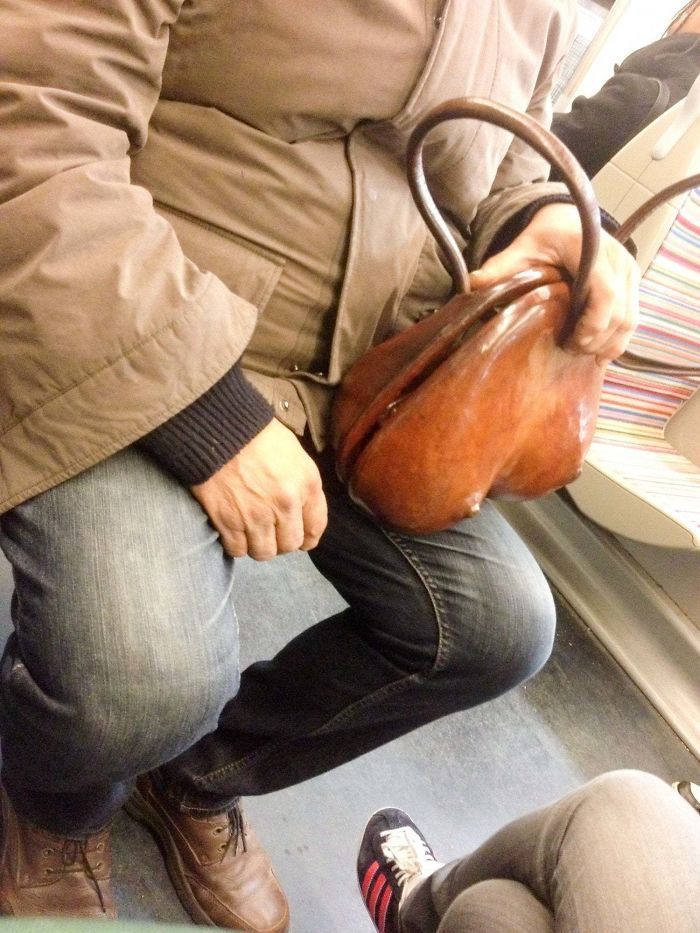 This Guy Had An Interestingly-Shaped Wooden Hand Bag In The Subway