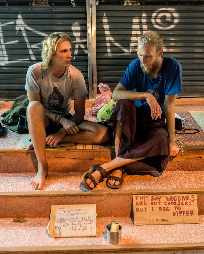 Beg Packers - Tourists Who Travel With The Intent To Beg For Money From The Locals To Fund Further Travel. Peep The Sign, Too