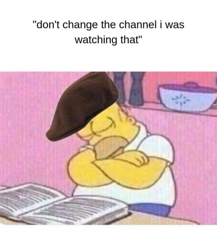 Cartoon character sleeping at a table with a book, wearing a cap, illustrating funny sleeping memes for humor.