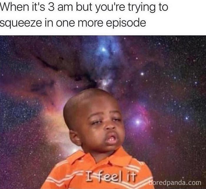 Tired child in orange shirt with sleepy eyes and space background representing funny sleeping memes about late nights.