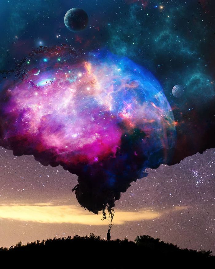 A person reaching up to a surreal, colorful cosmic cloud, creating a dreamlike atmosphere in a starry night sky.