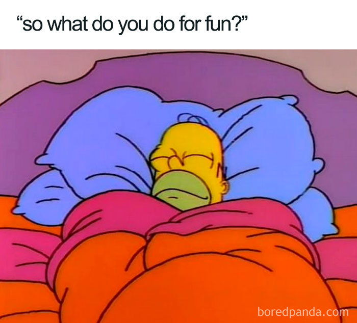 Cartoon character sleeping in bed with colorful blankets, illustrating a funny sleeping meme.