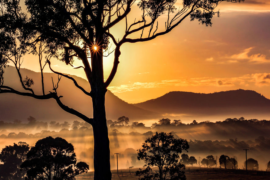 Sunrise Over Valley And Mountains