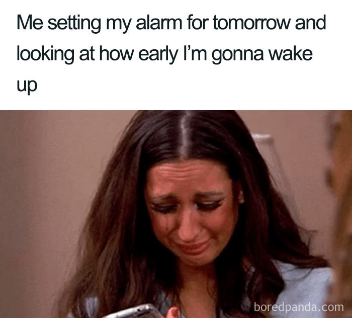 Woman looking upset at her phone, illustrating one of the funniest sleeping memes about early alarms and waking up.