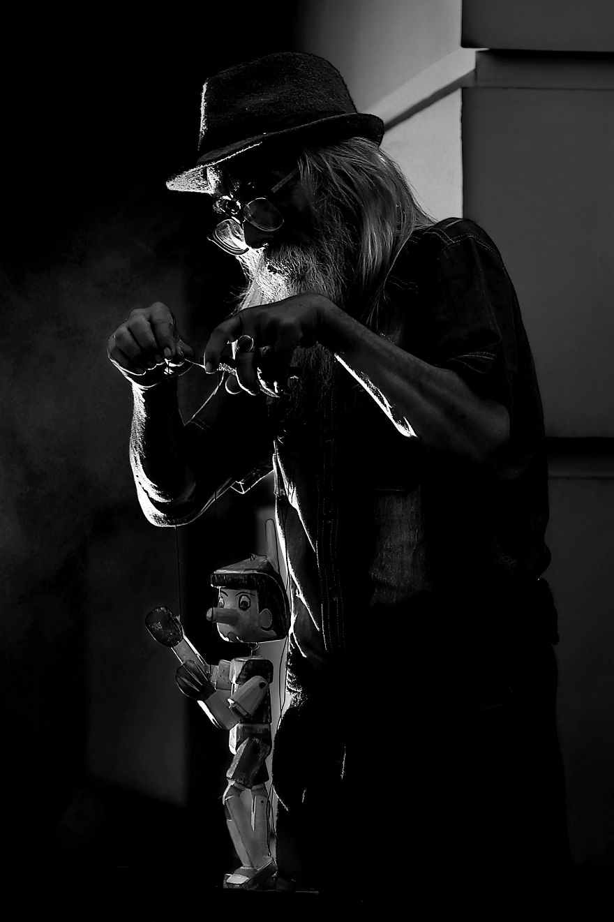 Old Man And Pinocchio Puppet