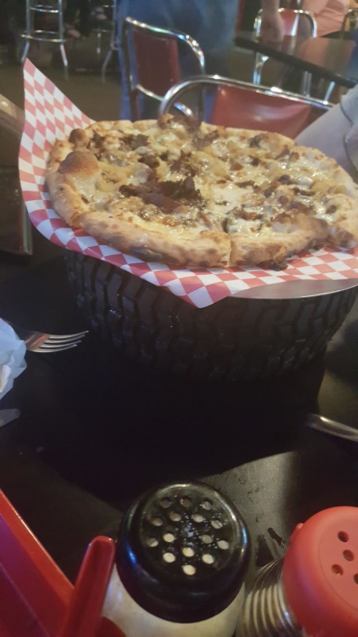 Pizza Served On A Tire