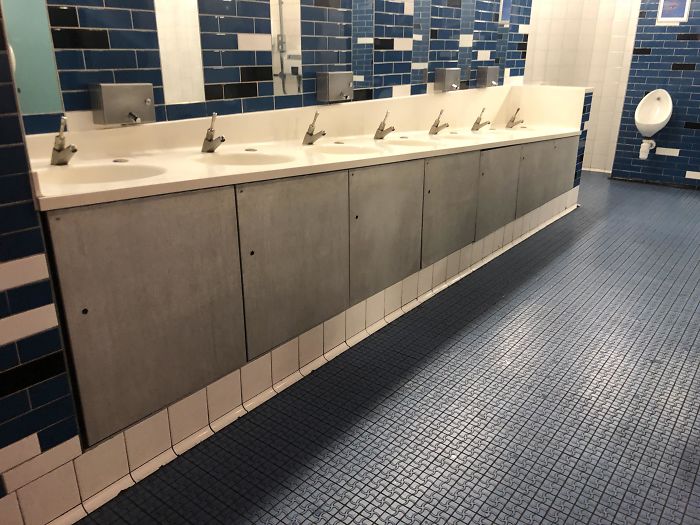 These Kids' Toilets In A London Museum Whose Sinks Slope To Cater For Progressively Shorter Children