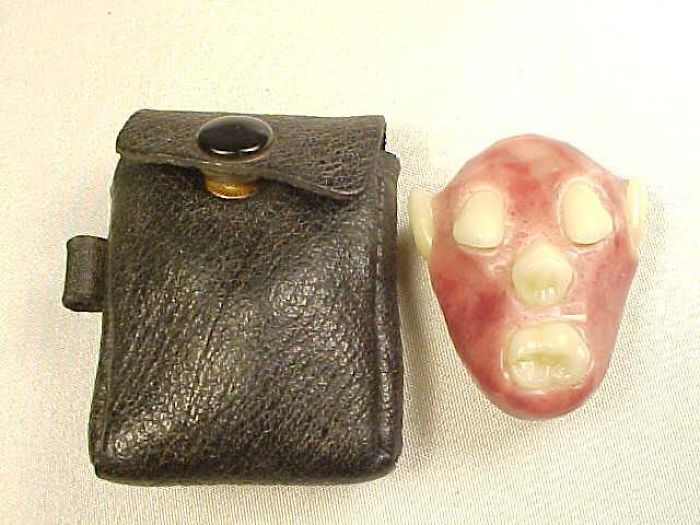 Found At An Estate Sale, No One There Knew Anything About Its Origin. Was Thought It Was Made From Baby Teeth But Had It Inspected By A Dentist, They Are Adult Teeth. Stored In It's Own Small Leatherette Case. What Is This Thing?