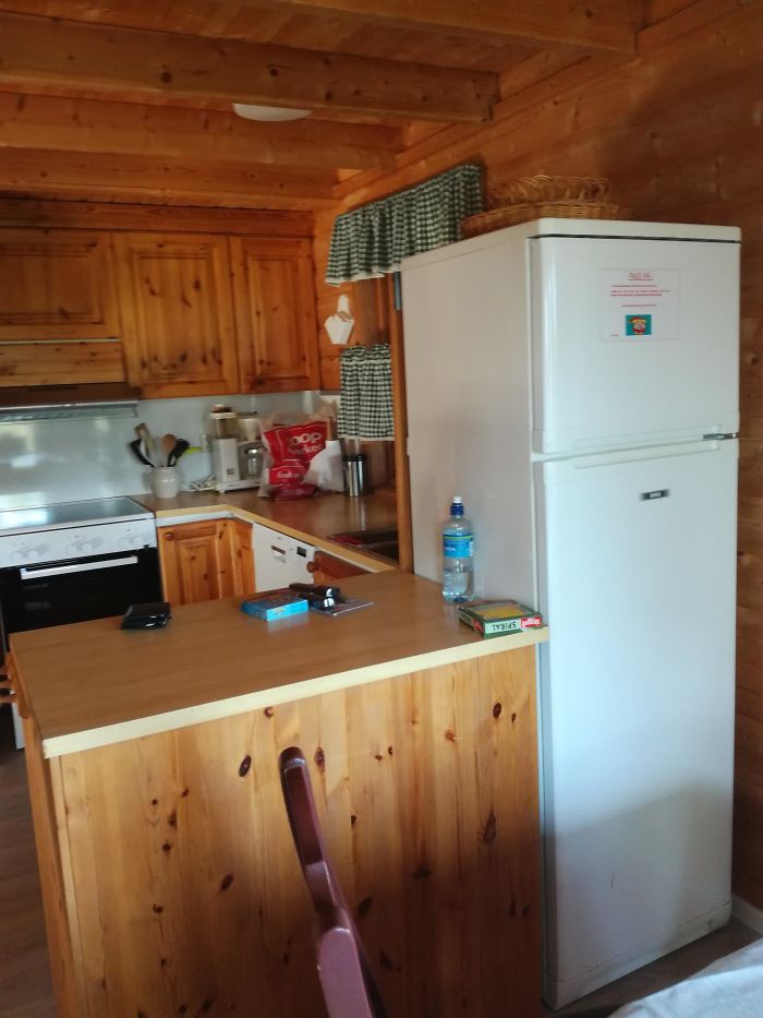 The Kitchen Is Behind The Fridge