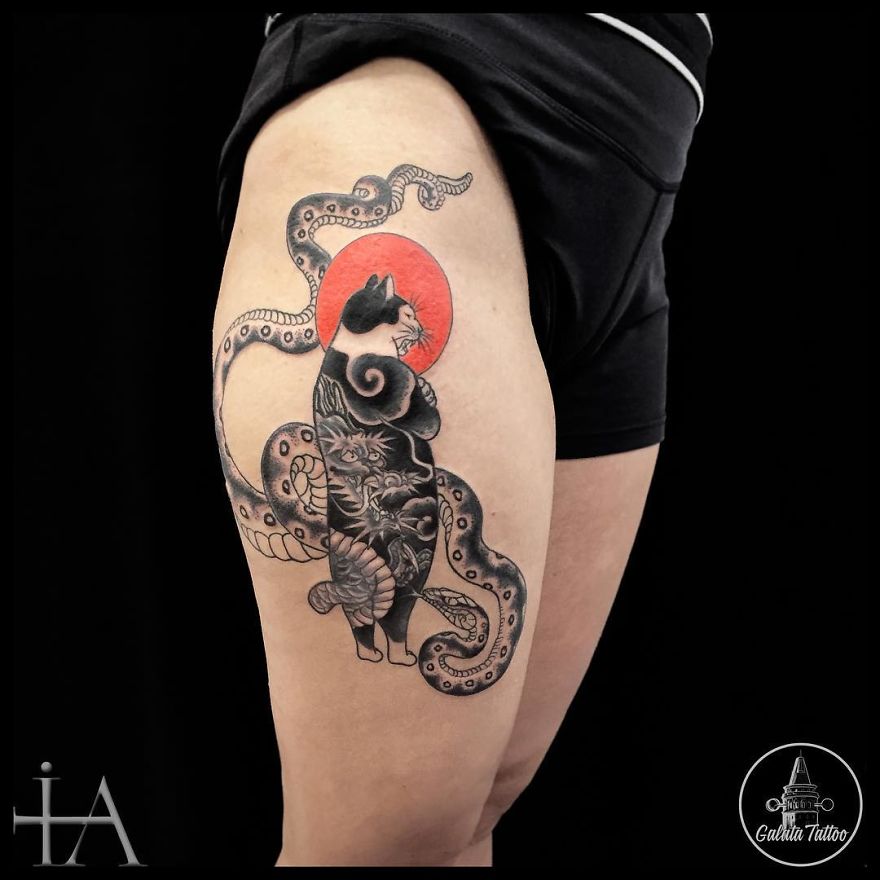 Animal tattoo on a leg, featuring a stylized cat and intricate patterns by a Turkish tattoo artist.