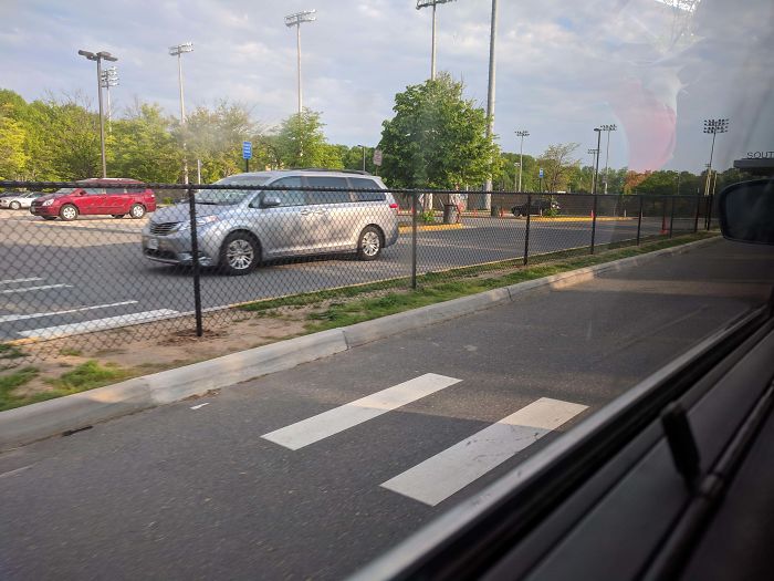 My High School Felt The Need To Install A Fence Separating The Student Parking Lot And The School. And To Block Off The Crosswalk