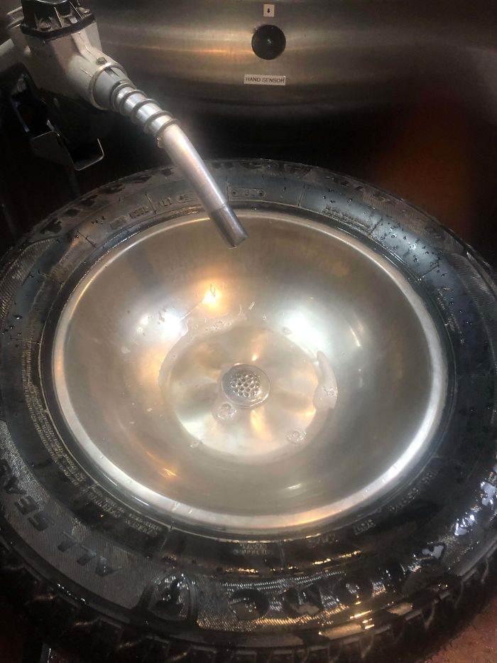 The Restaurant I Am In Has Tires For The Bathroom Sinks And Gasoline Pumps For The Faucets