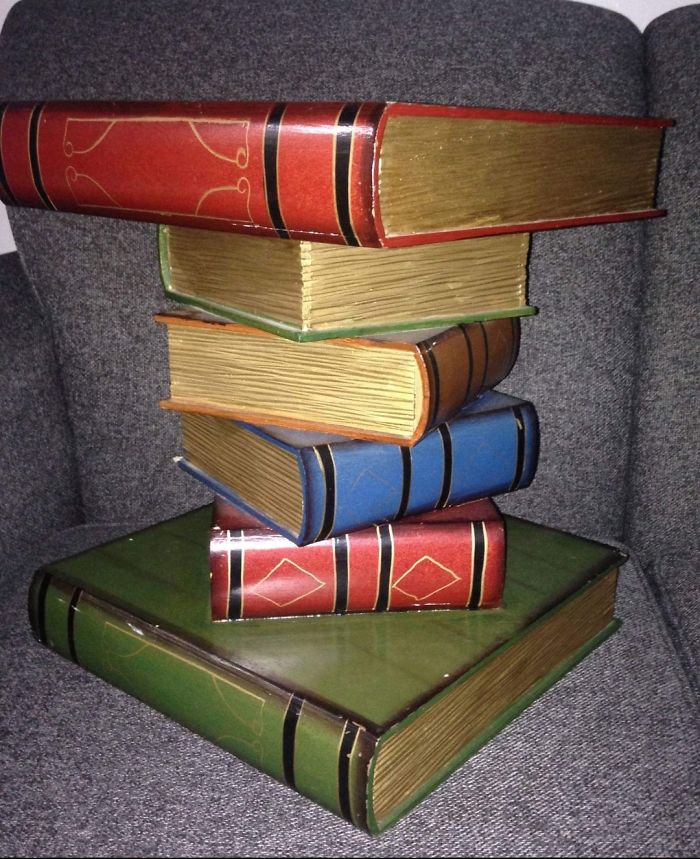 It's A Table!!! It's Solid Wood And Has No Drawers And The Books Do Not Open! As For The Size, In The Picture It's Sitting On My Ver Large Couch And Covers Almost A Whole Cushion. It's Approx 2-2.5ft Tall