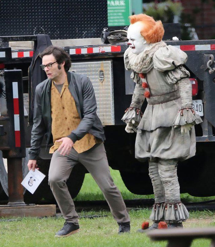 Bill Hader spooked on set by Pennywise with crossed eyes in costume. Bill Hader spooked on set by Pennywise with crossed eyes in costume.