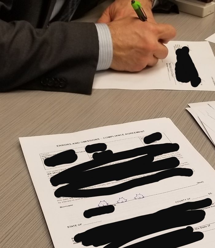 Guy Draws Cat Heads As A Joke Signature On His ID, Realizes He Made A Mistake When He Has To Sign Mortgage Papers Years Later