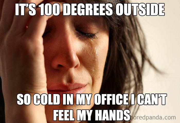 Woman holding head, office freezing meme text overlay about indoor cold.