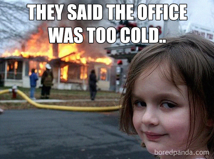 Girl smirking in front of a burning house, text reads: "They said the office was too cold." Office freezing meme.