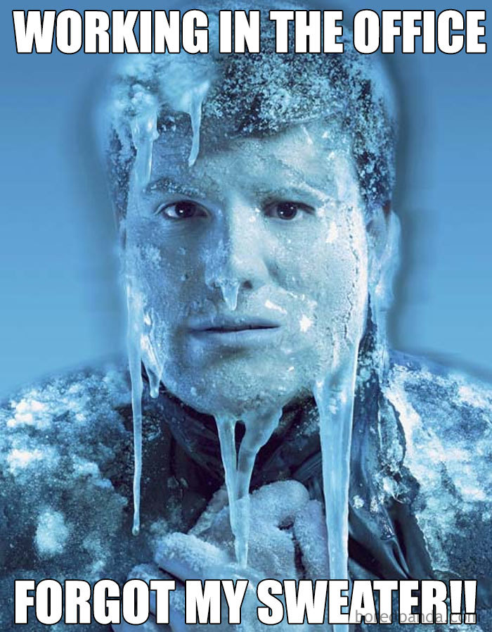 Frozen person in office, covered with icicles, humorously depicting freezing office conditions.