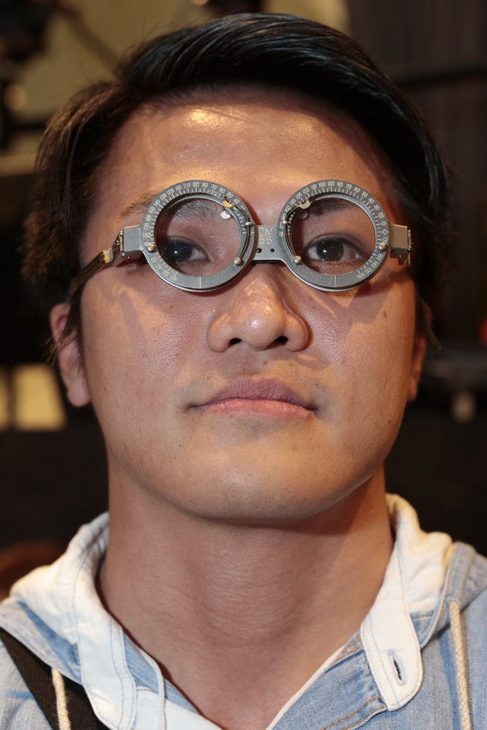 A Person In The Middle Of Making Glasses
