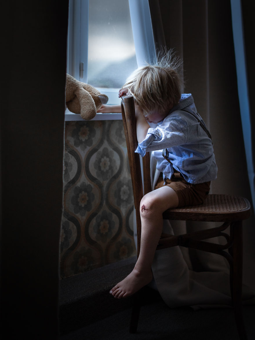 Niel, Belgium- A Boy Hiding His Pace From His Mom (He Was Actually Goofing Around, Not Crying)