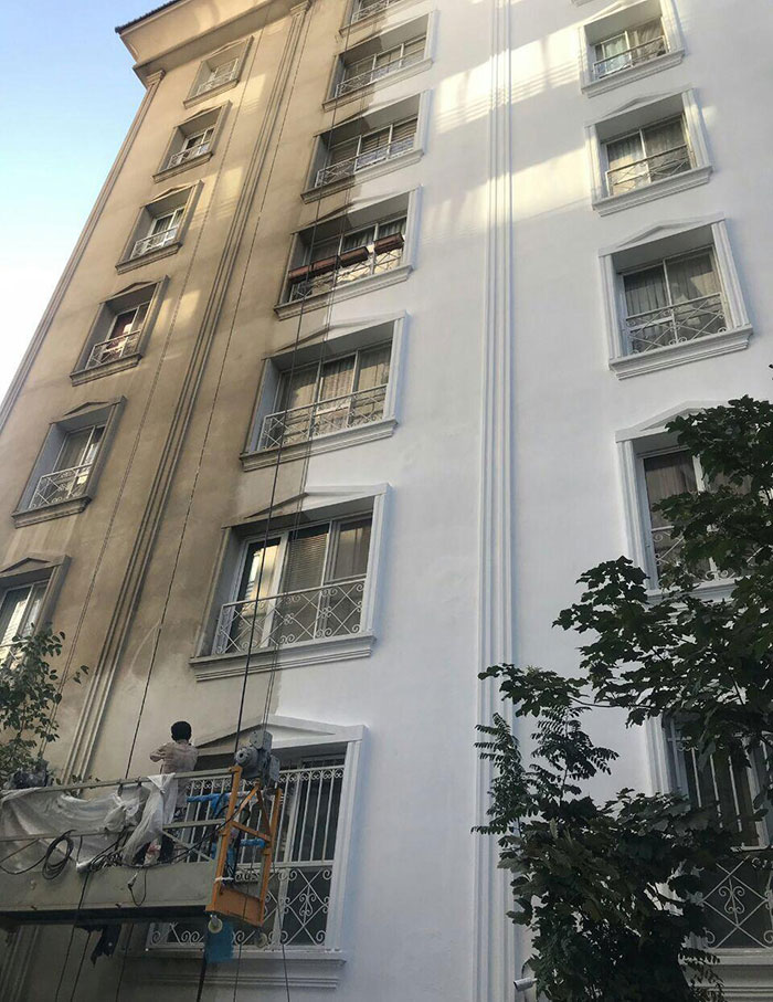 The Frontal View Of An Old Building Being Washed In My Neighborhood