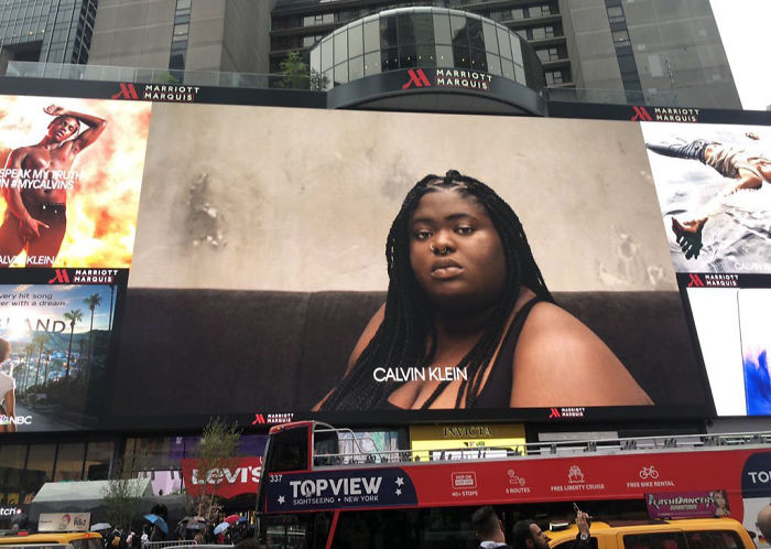 Woman Shames Calvin Klein's Plus-Size Rapper Billboard, She Responds And Starts A Heated Discussion