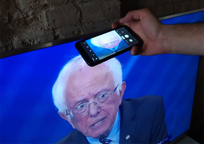 "Putting Your Phone Near The Top Of Your TV And Tilting It Down Turns The Candidates Into Debating Big Brains"