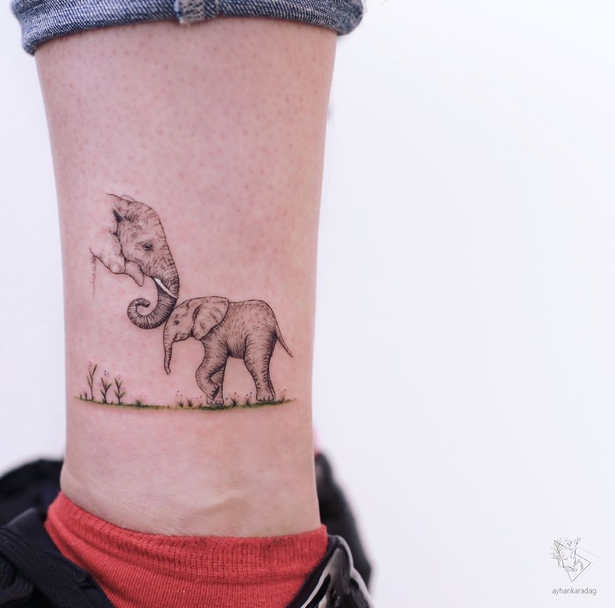 Elephant tattoo design on skin, showcasing intricate artwork and detail.