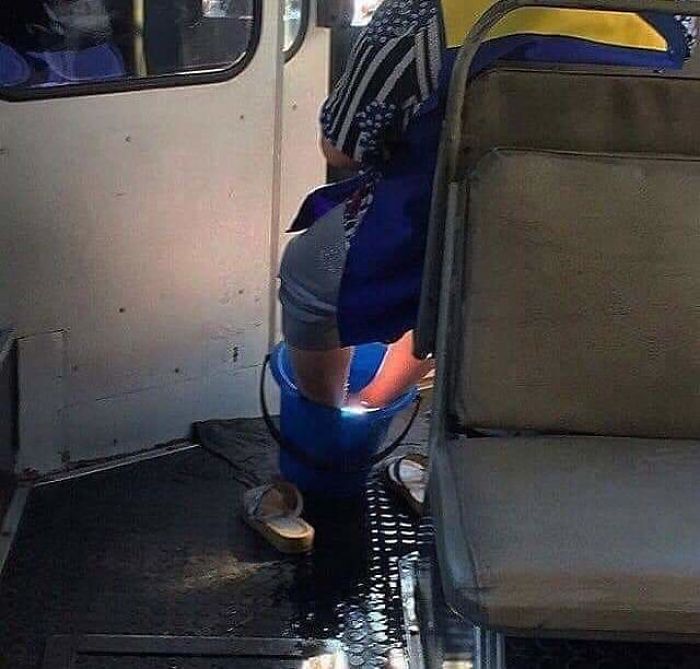 Woman Washing Her Feet In The Train