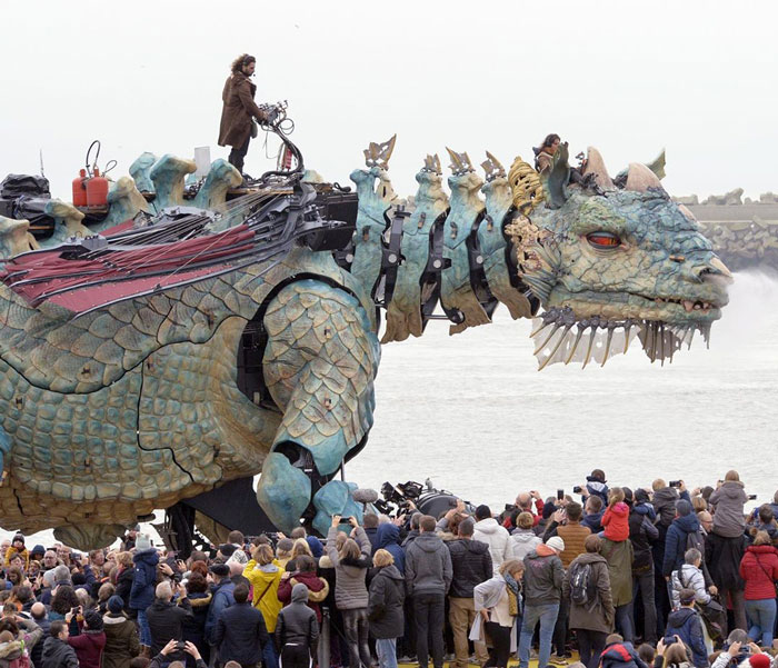 The Citizens Of Calais Witnessed A 25-Meter-Long Fire-Breathing Mechanical Dragon Manned By 17 People