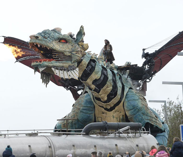 The Citizens Of Calais Witnessed A 25-Meter-Long Fire-Breathing Mechanical Dragon Manned By 17 People