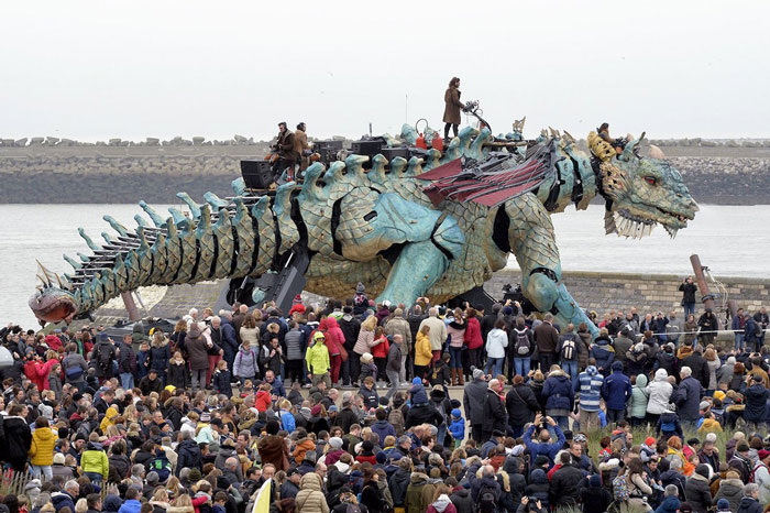 The Citizens Of Calais Witnessed A 25-Meter-Long Fire-Breathing Mechanical Dragon Manned By 17 People