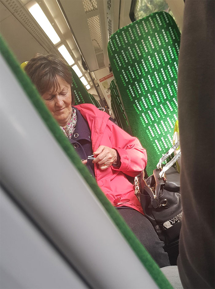 Woman Clipping Her Nails On The Train UK